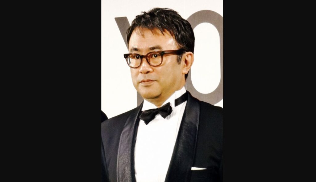 2013年の東京国際映画祭で、眼鏡と蝶ネクタイを着用した三谷幸喜